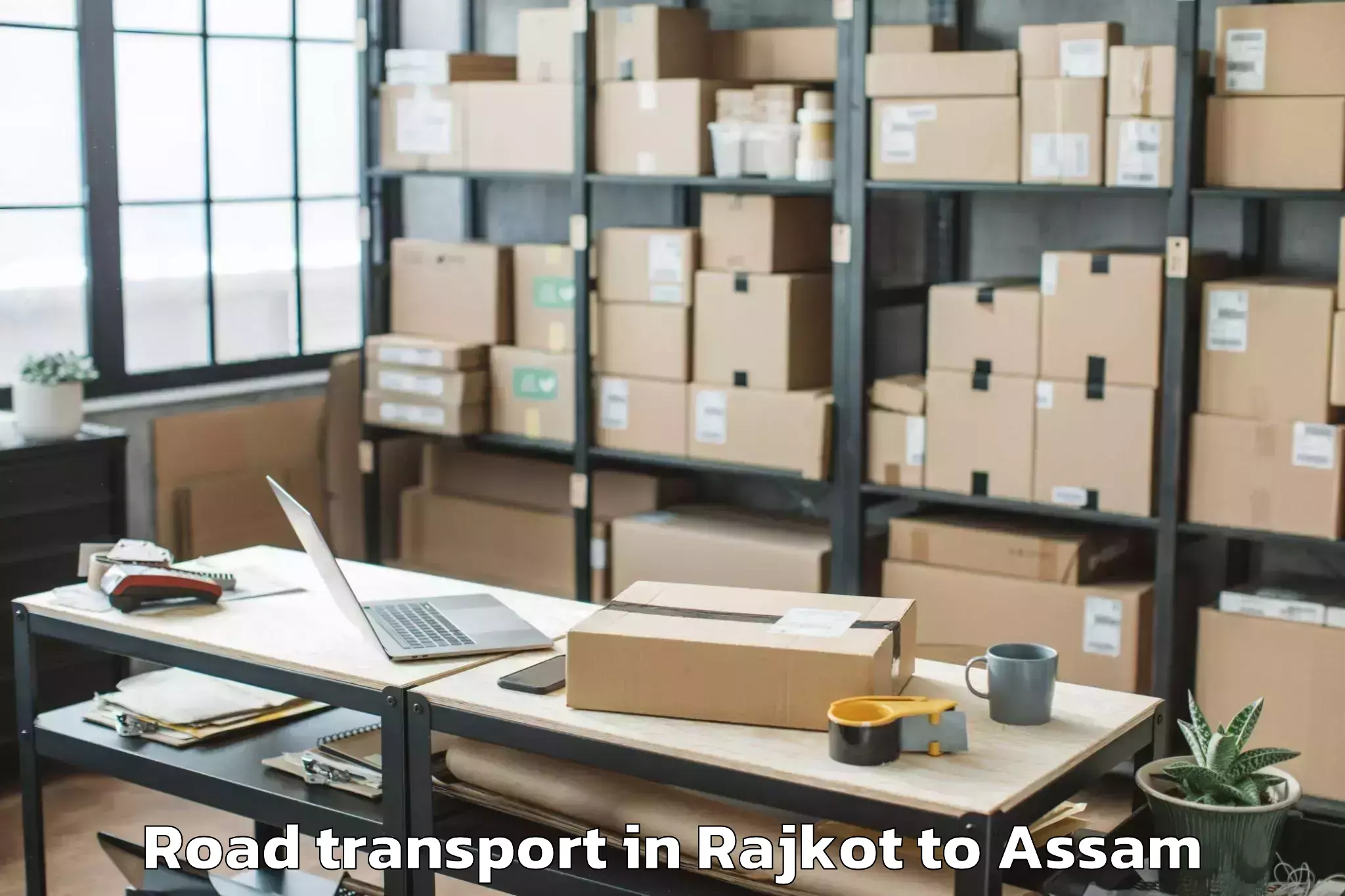 Quality Rajkot to Golokganj Pt Road Transport